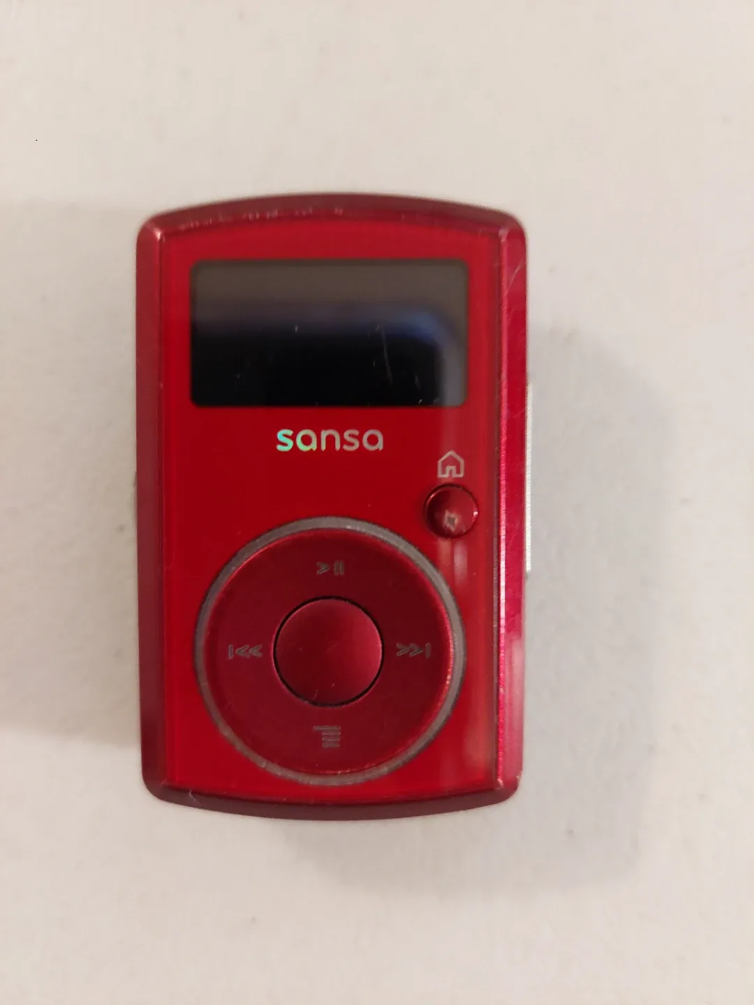 Red Sansa MP3 Player with Charger image indicator(2)