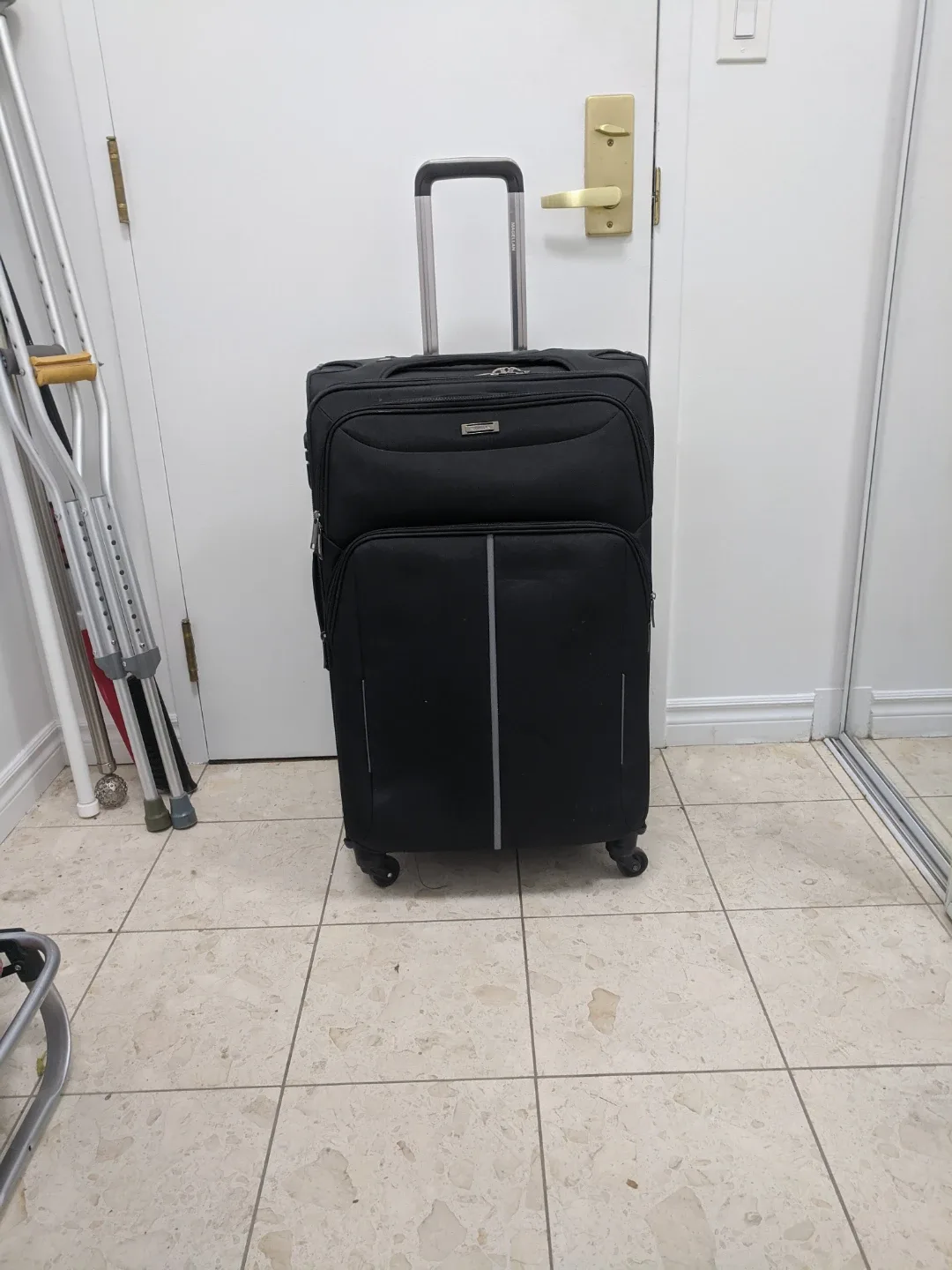 Magellan Black Rolling Suitcase