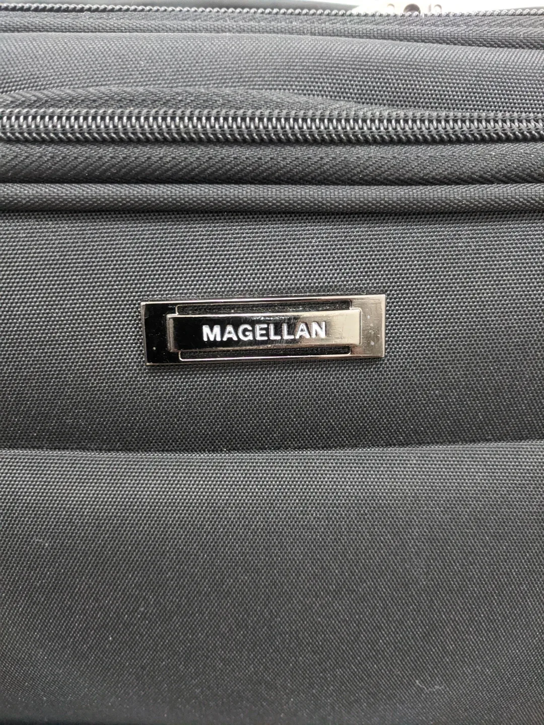 Magellan Black Rolling Suitcase image indicator(5)