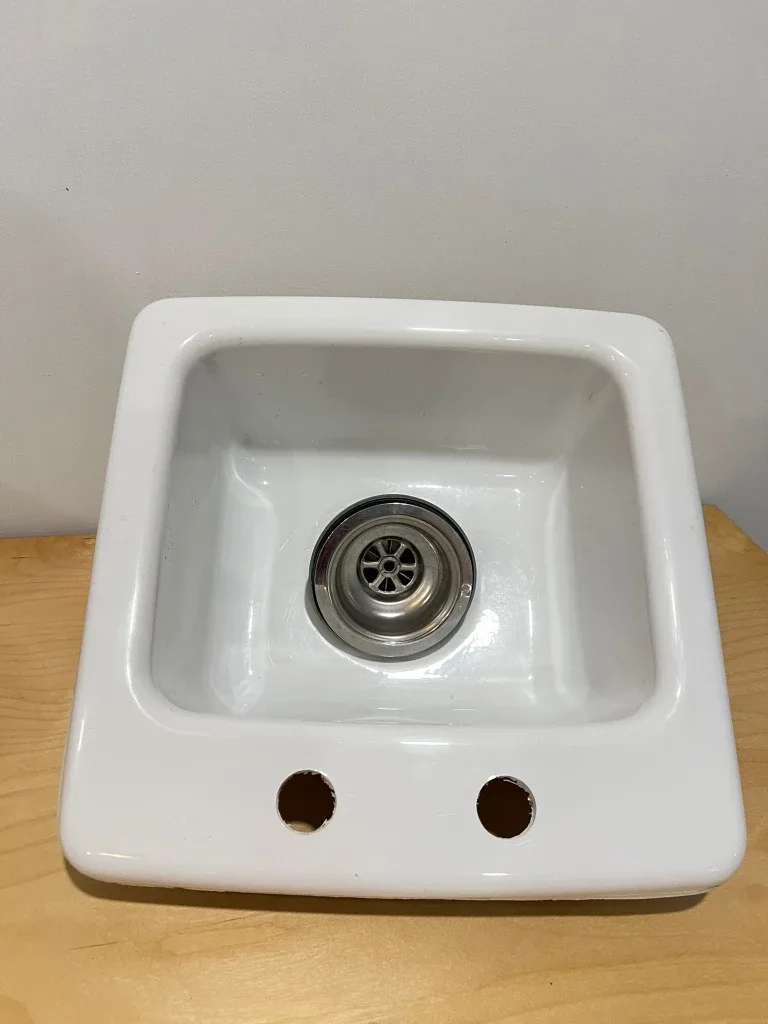 White Ceramic Sink with Drain