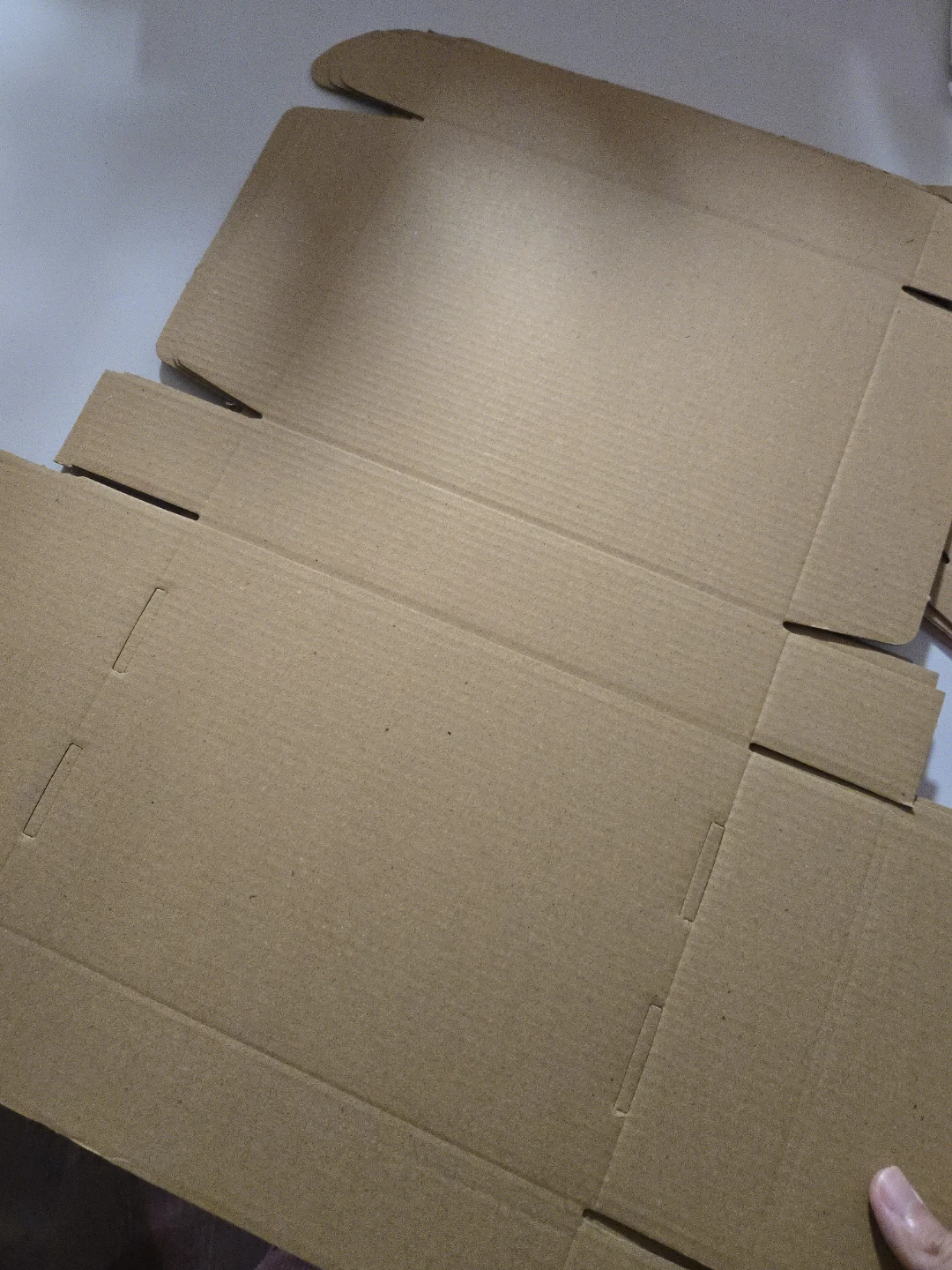 A bundle of 23*16*5cm shipping boxes - photo 3