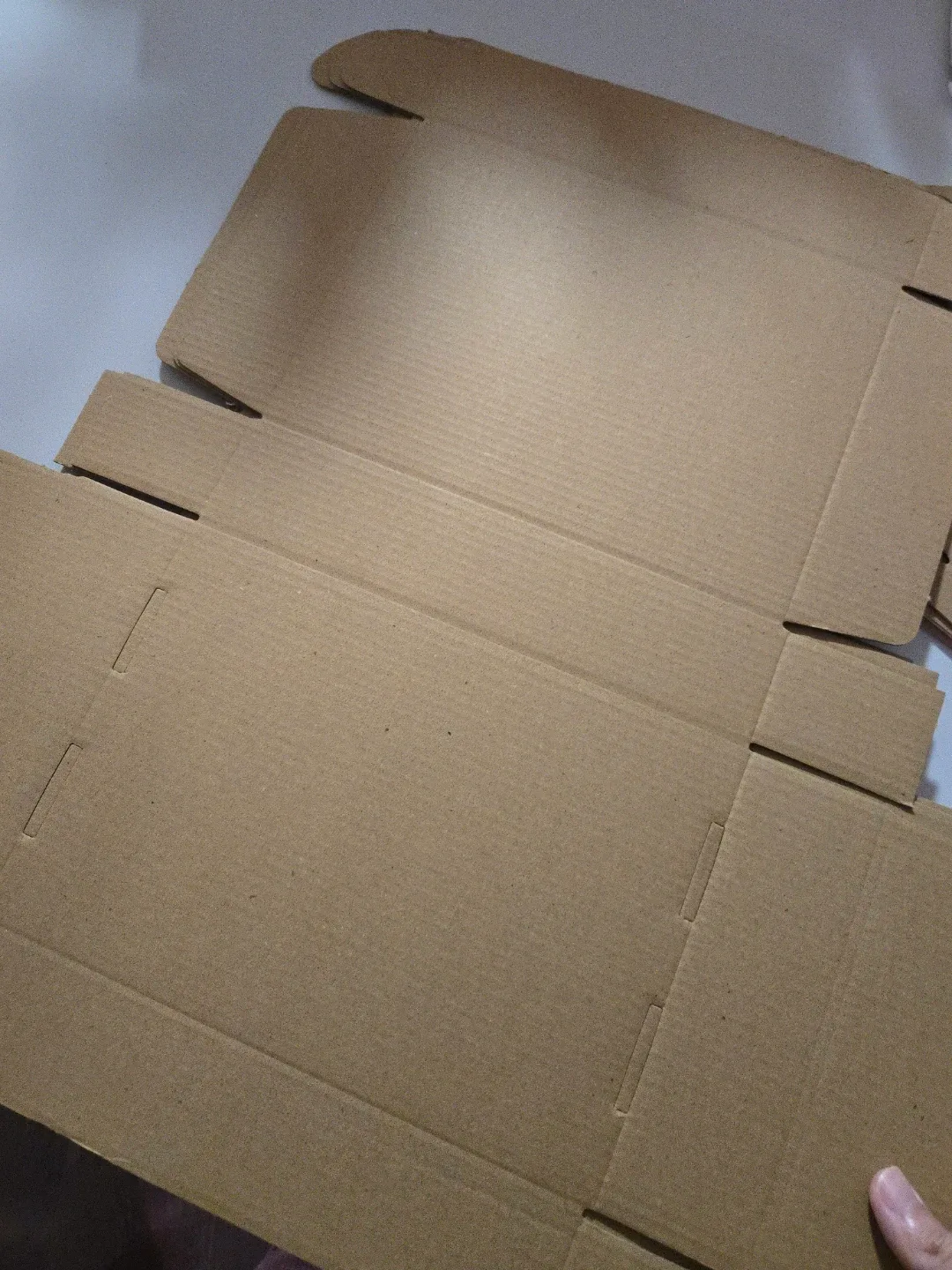 A bundle of 23*16*5cm shipping boxes image indicator(3)