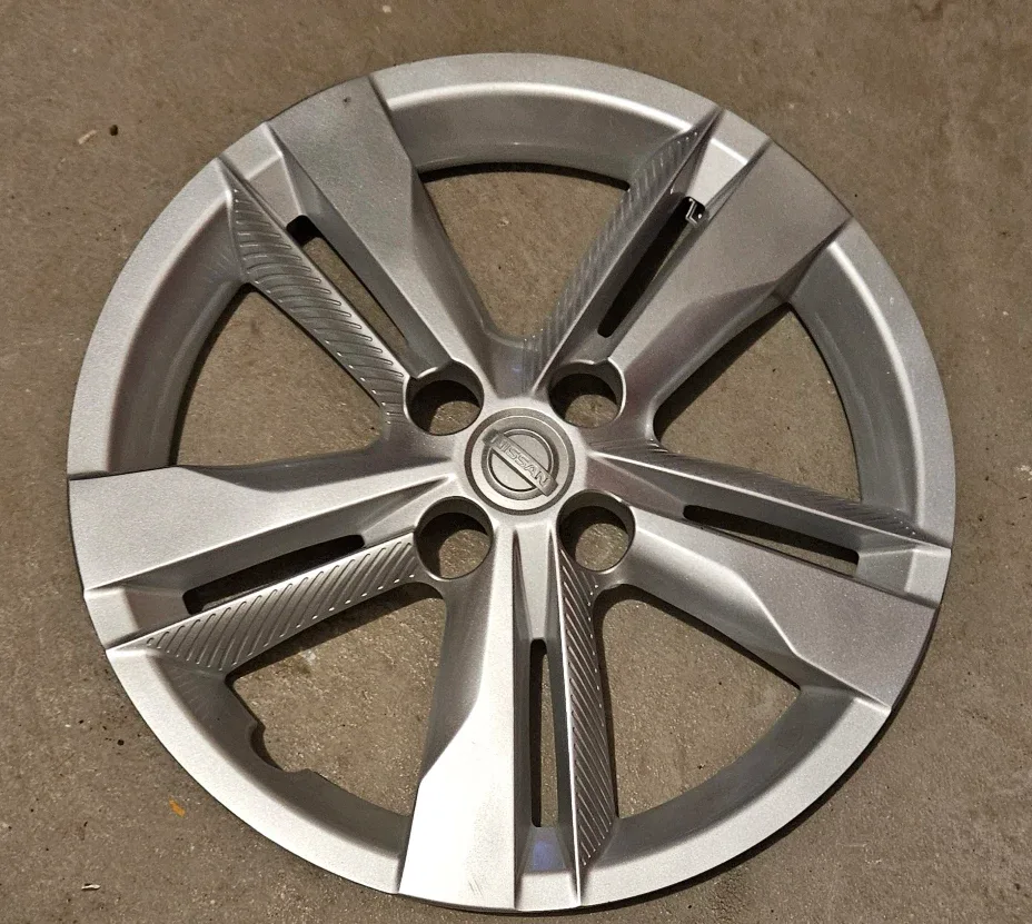 Steel Rims 4 x 100 with Nissan Hubcaps