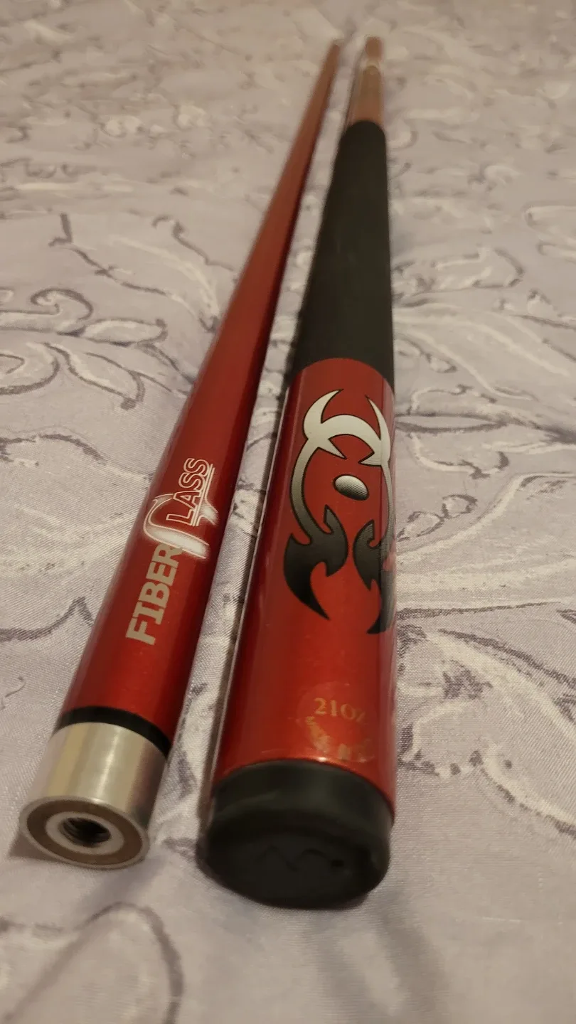 Variety of different pool cues image indicator(2)