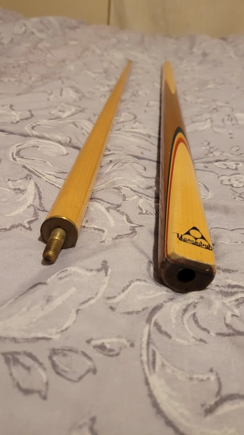 Variety of different pool cues image indicator(8)