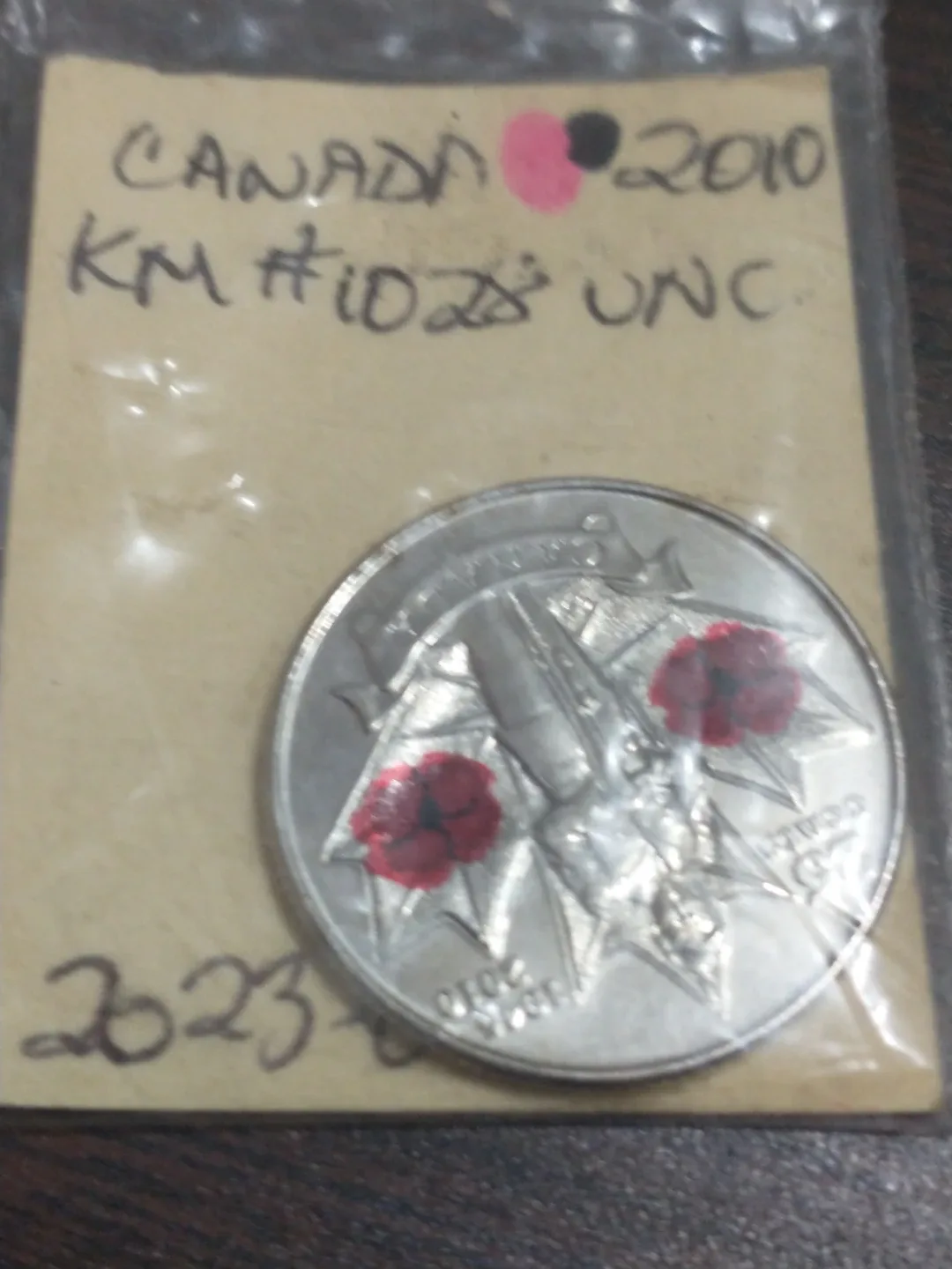 Beautiful 2010 Canada uncirculated colourized quarter KM #1028 image indicator(3)