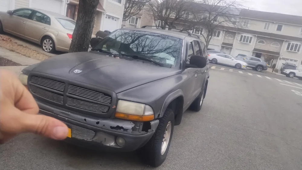 dodge durango 99 sold as is. needs work image indicator(8)