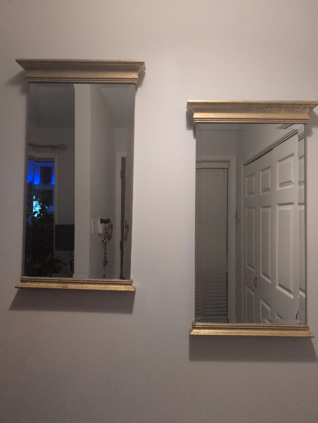 Two Gold Framed Mirrors