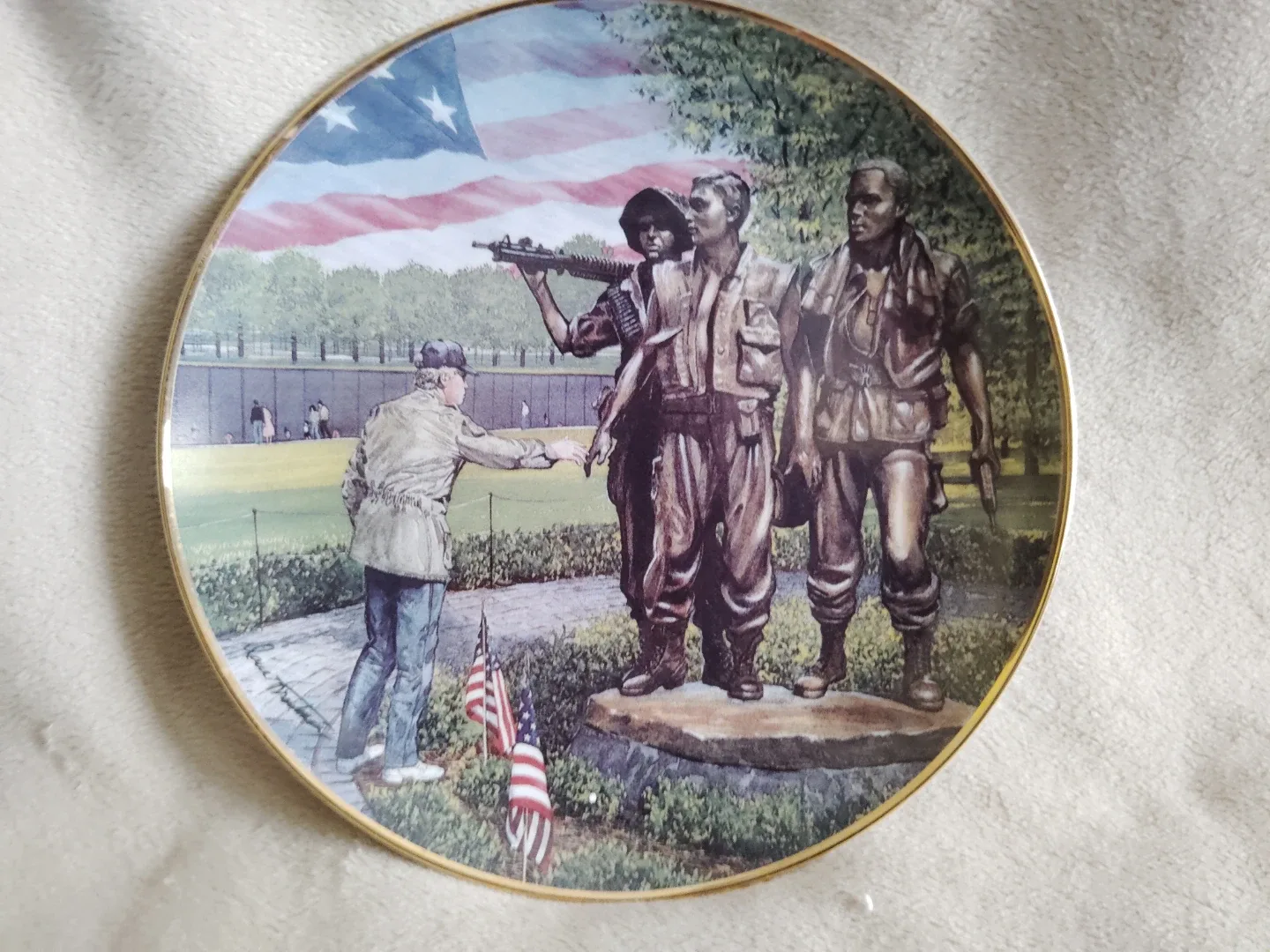 Touching the Memory Vietnam Veterans Memorial Plate image indicator(2)