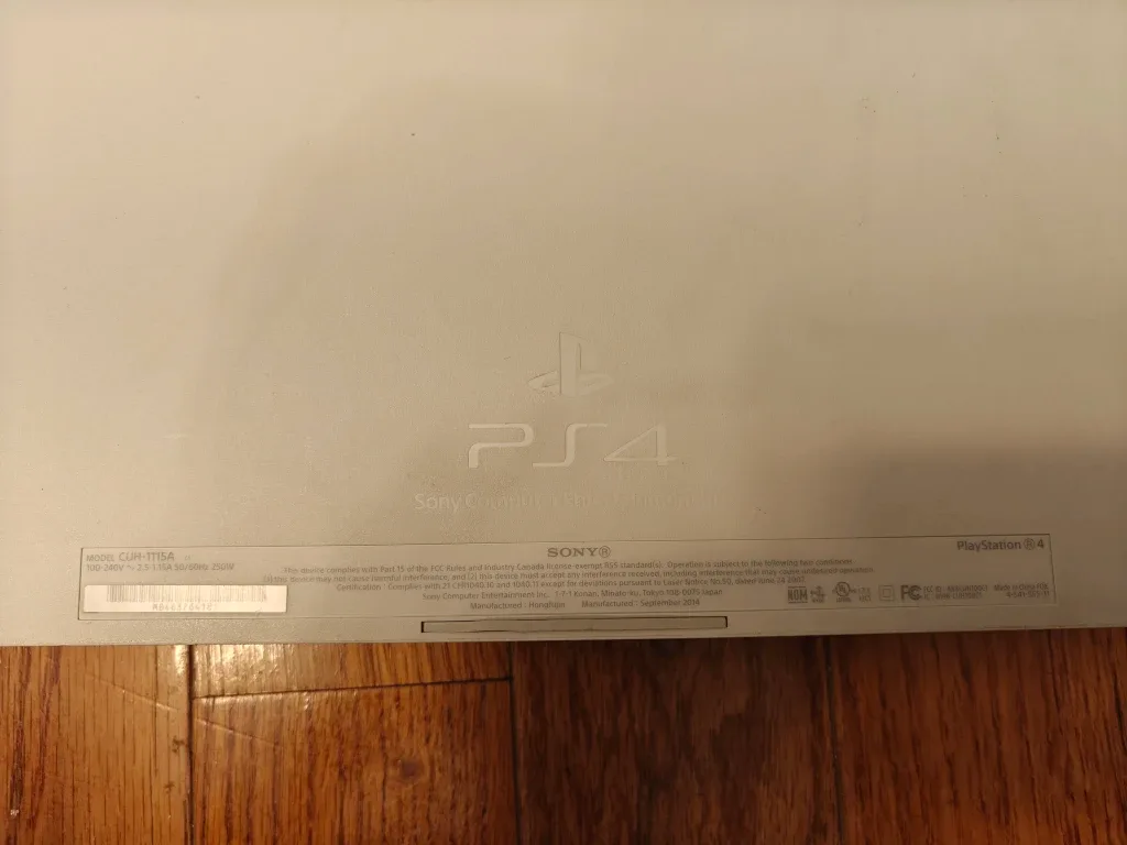 PS4 white with a controller and games image indicator(2)