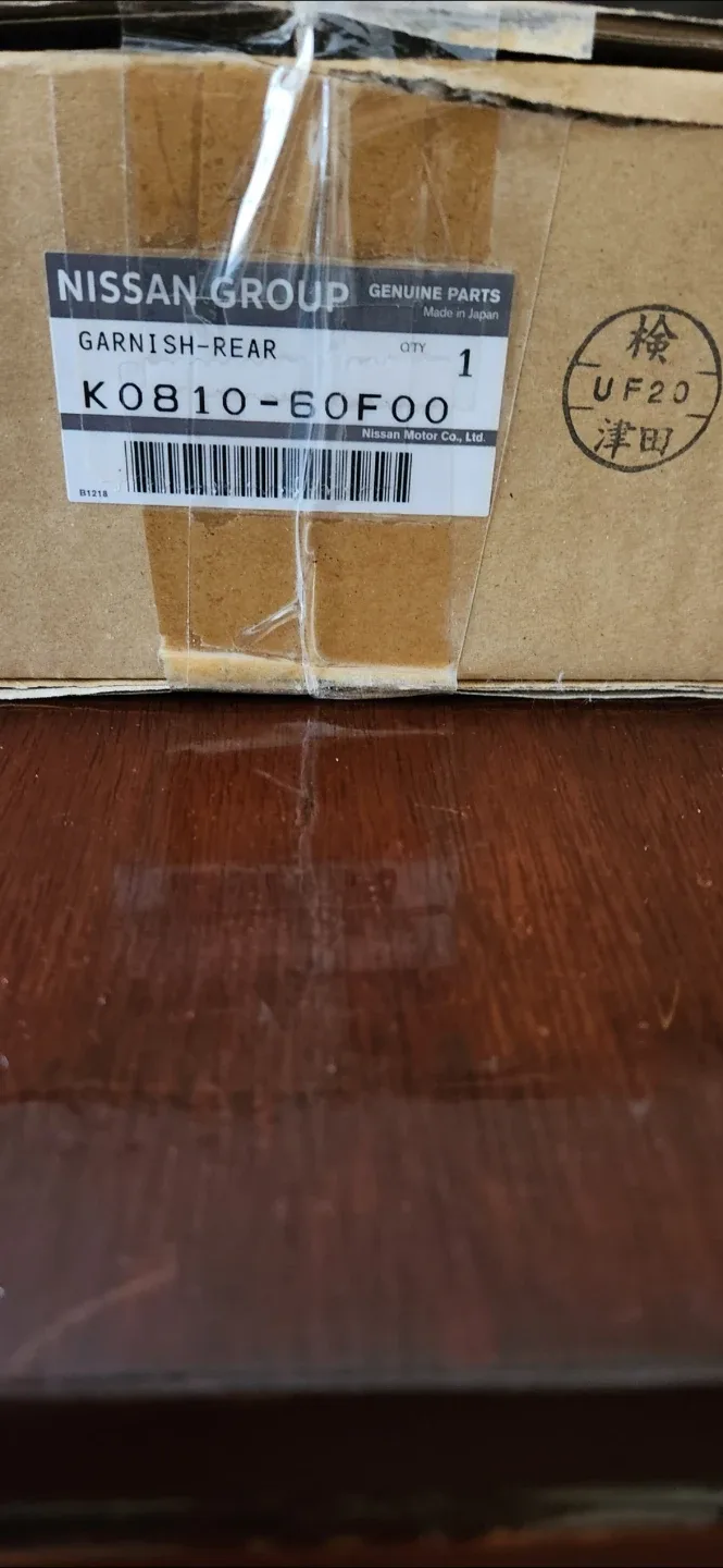 Nissan K0810-60F00 Rear Garnish - New!