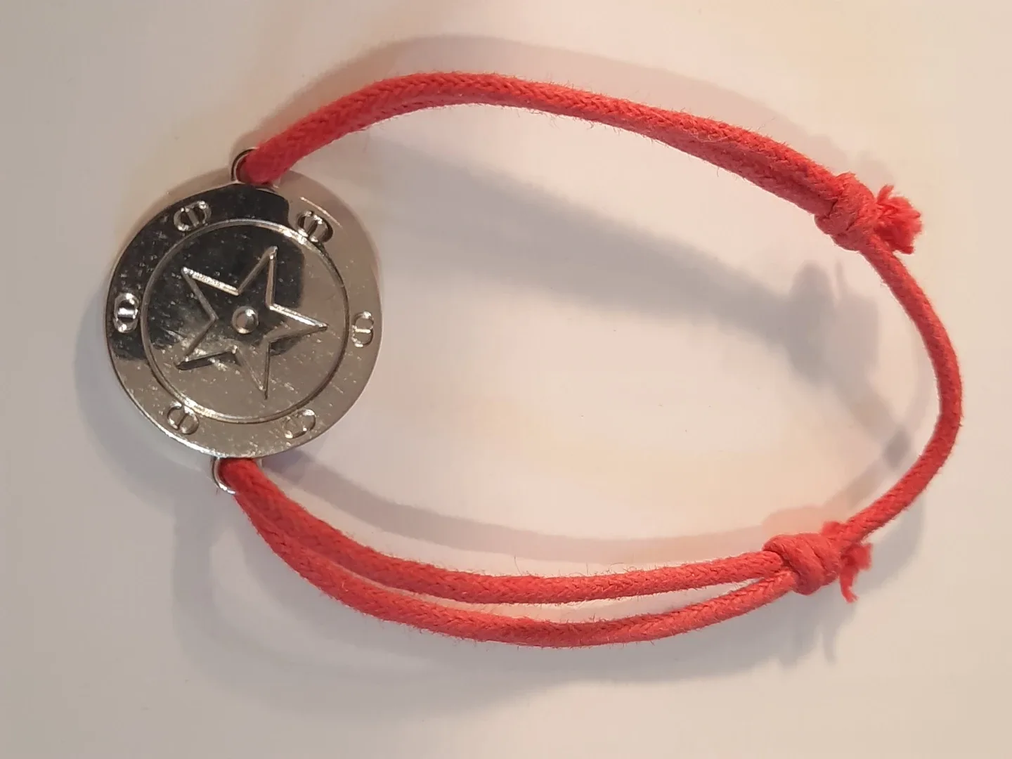 Cristian dior bracelet on red cord image indicator(4)