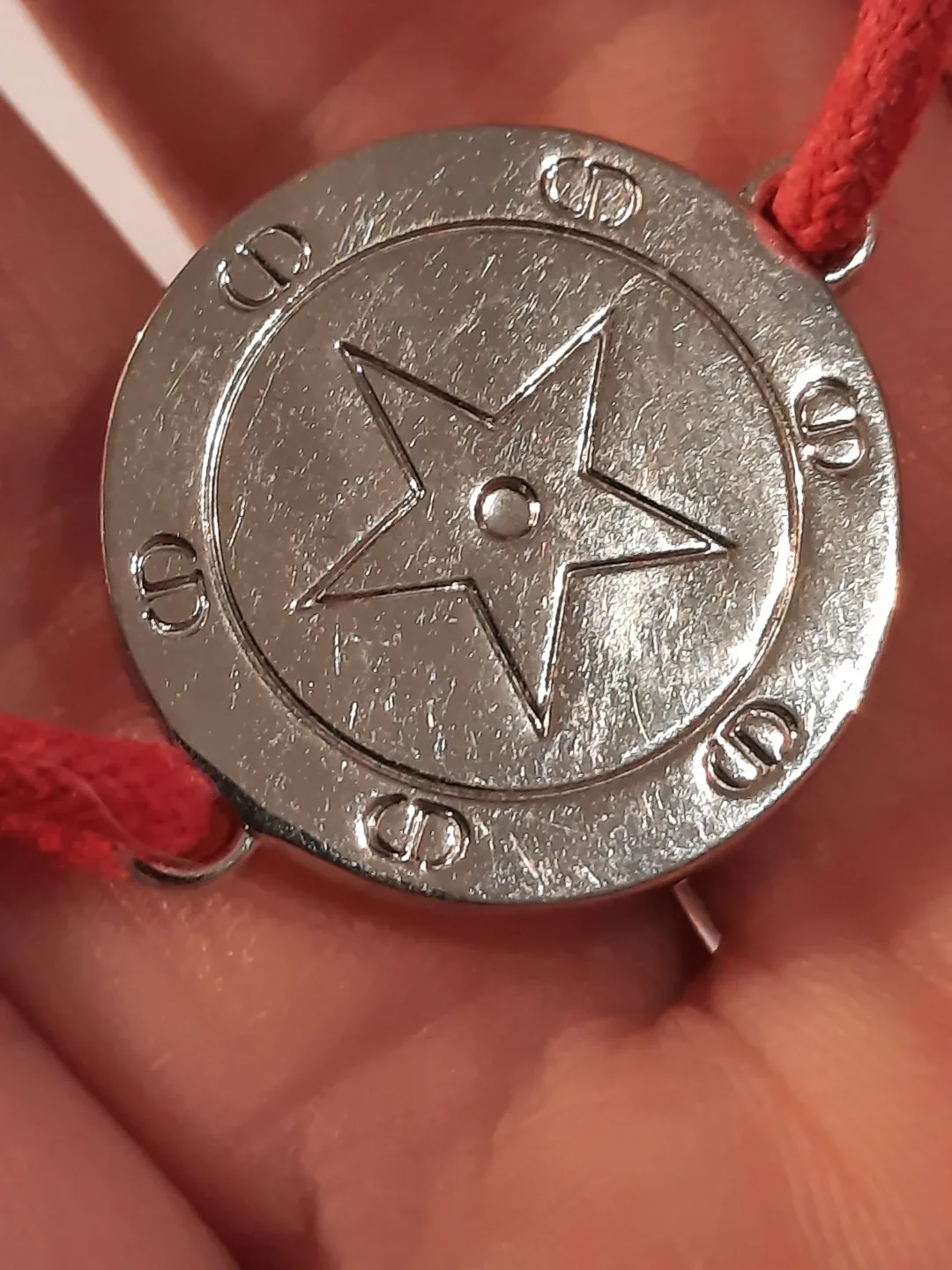 Cristian dior bracelet on red cord image indicator(5)