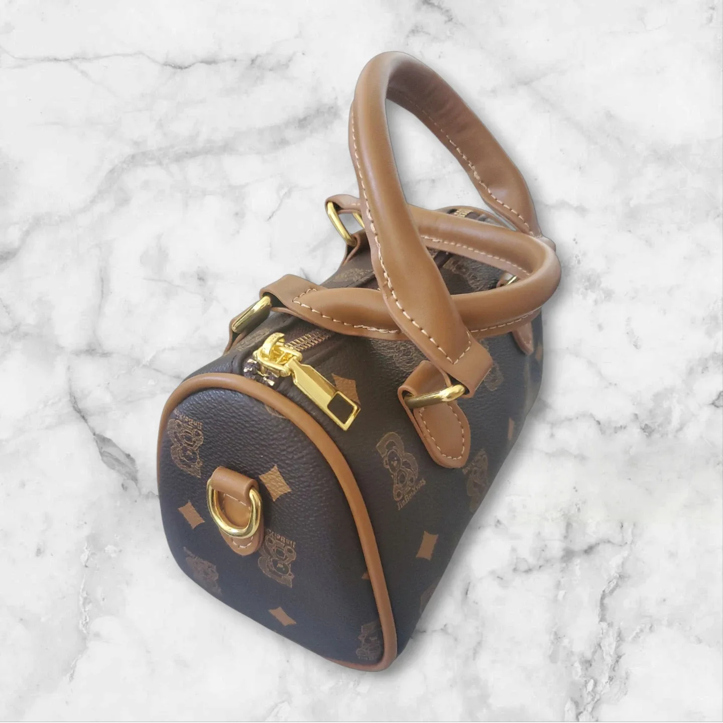 Brown Barrel Handbag with Bear Pattern image indicator(5)