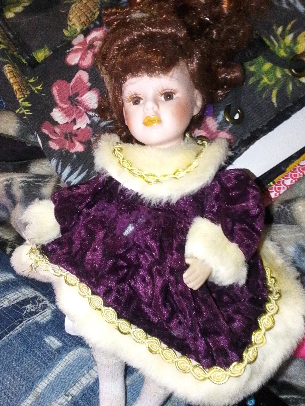 Porcelain Doll in Purple Velvet Dress