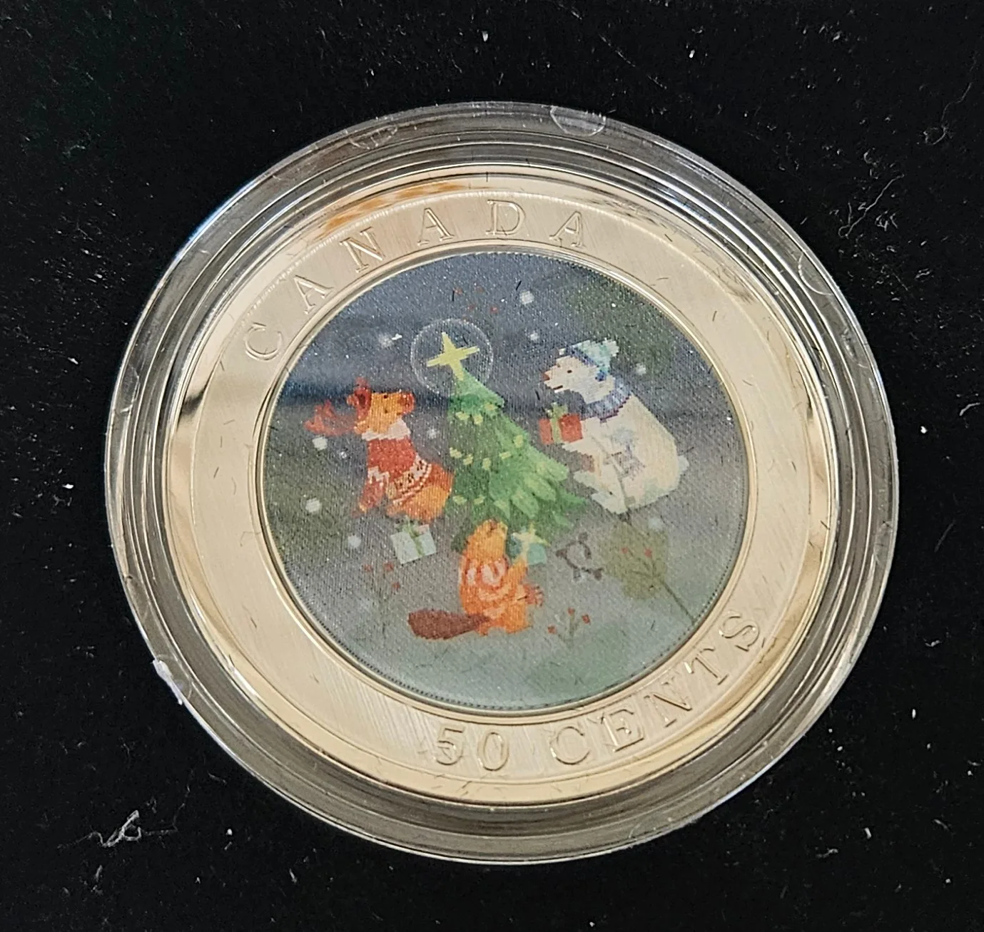 New Trimming The Holiday Tree Coin 2024 Mint image indicator(2)