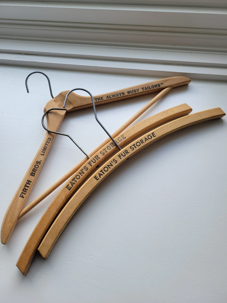 Eaton's Fur Storage Wood Advertising Hangers