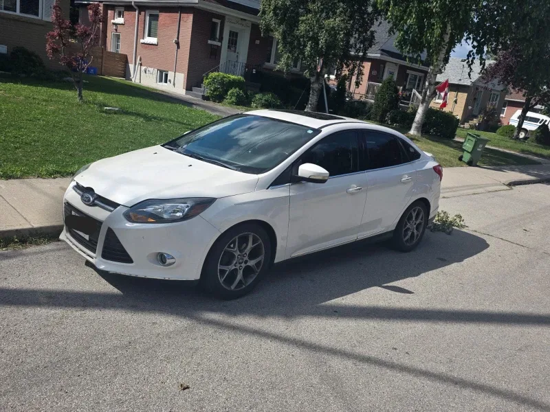 Ford Focus - White Sedan
