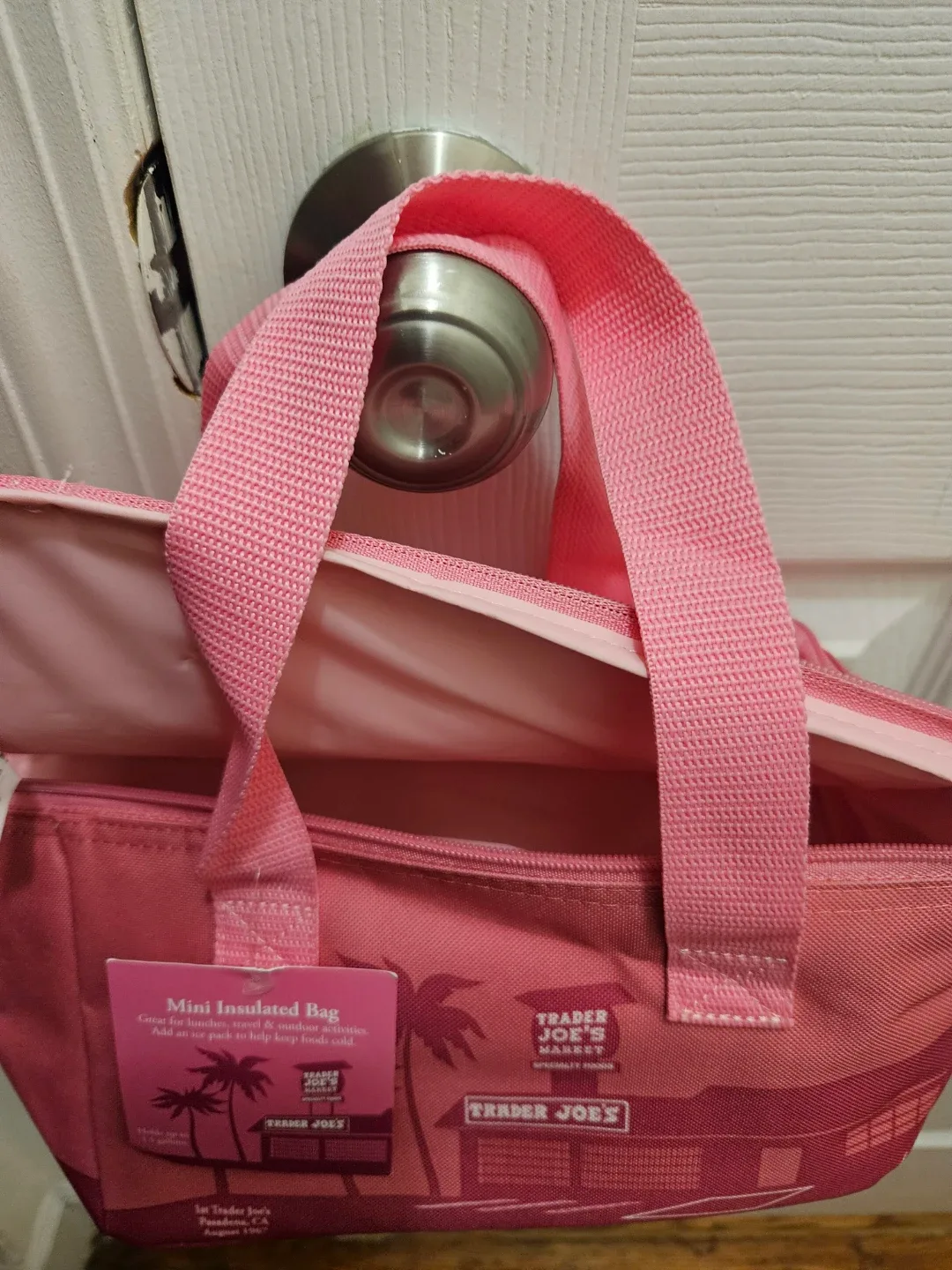 Pink Trader Joe's mini cooler bag.
