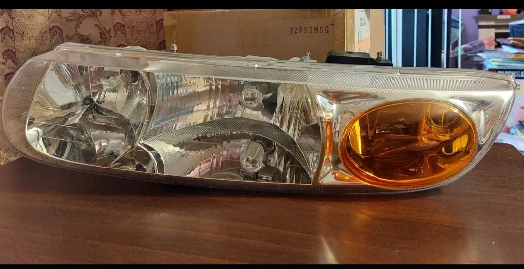 TYC 20-6016-00-1N Saturn Driver Side Headlight Assembly image indicator(5)