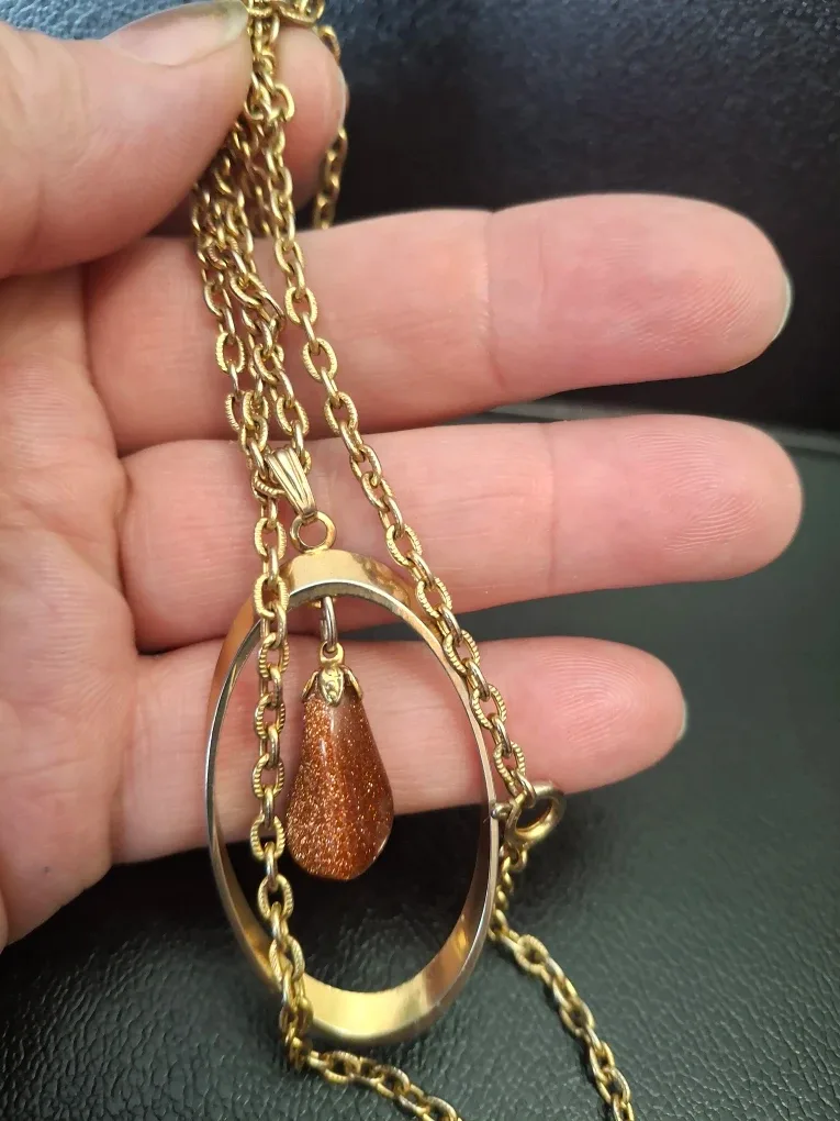 Gold Tone Necklace with Sparkly Pendant image indicator(4)