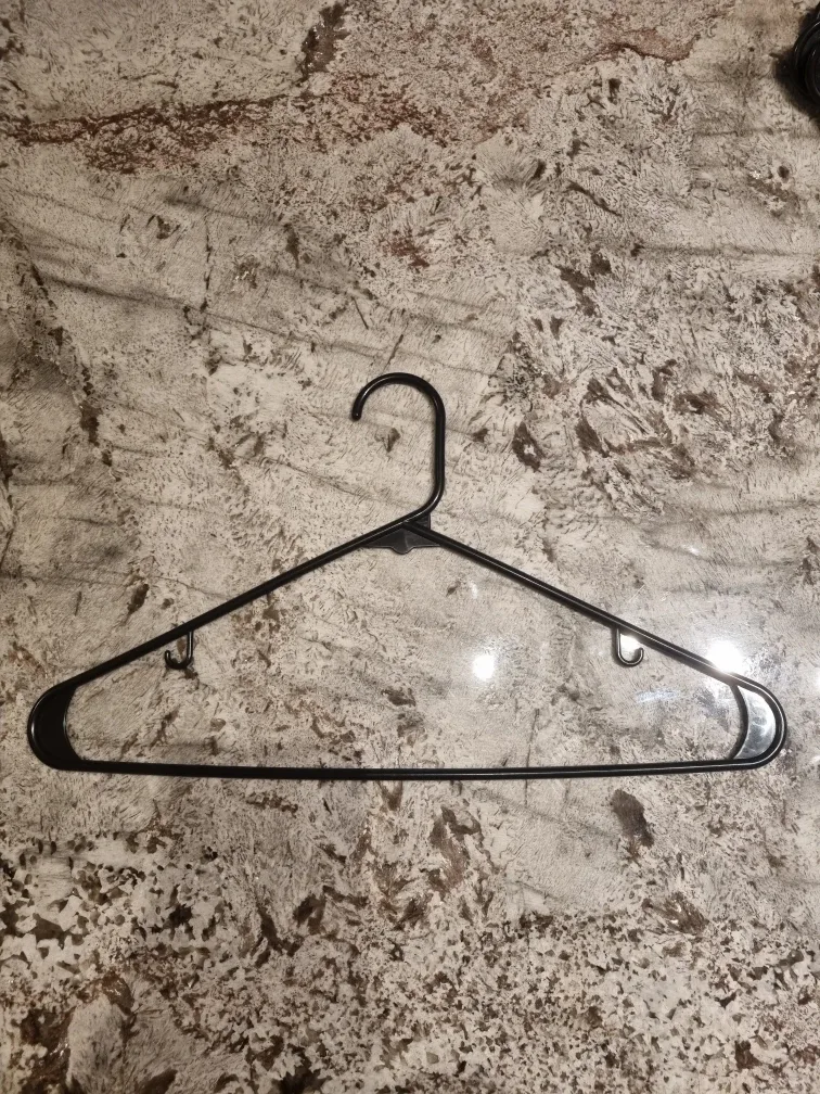 39 standard black plastic hangers.