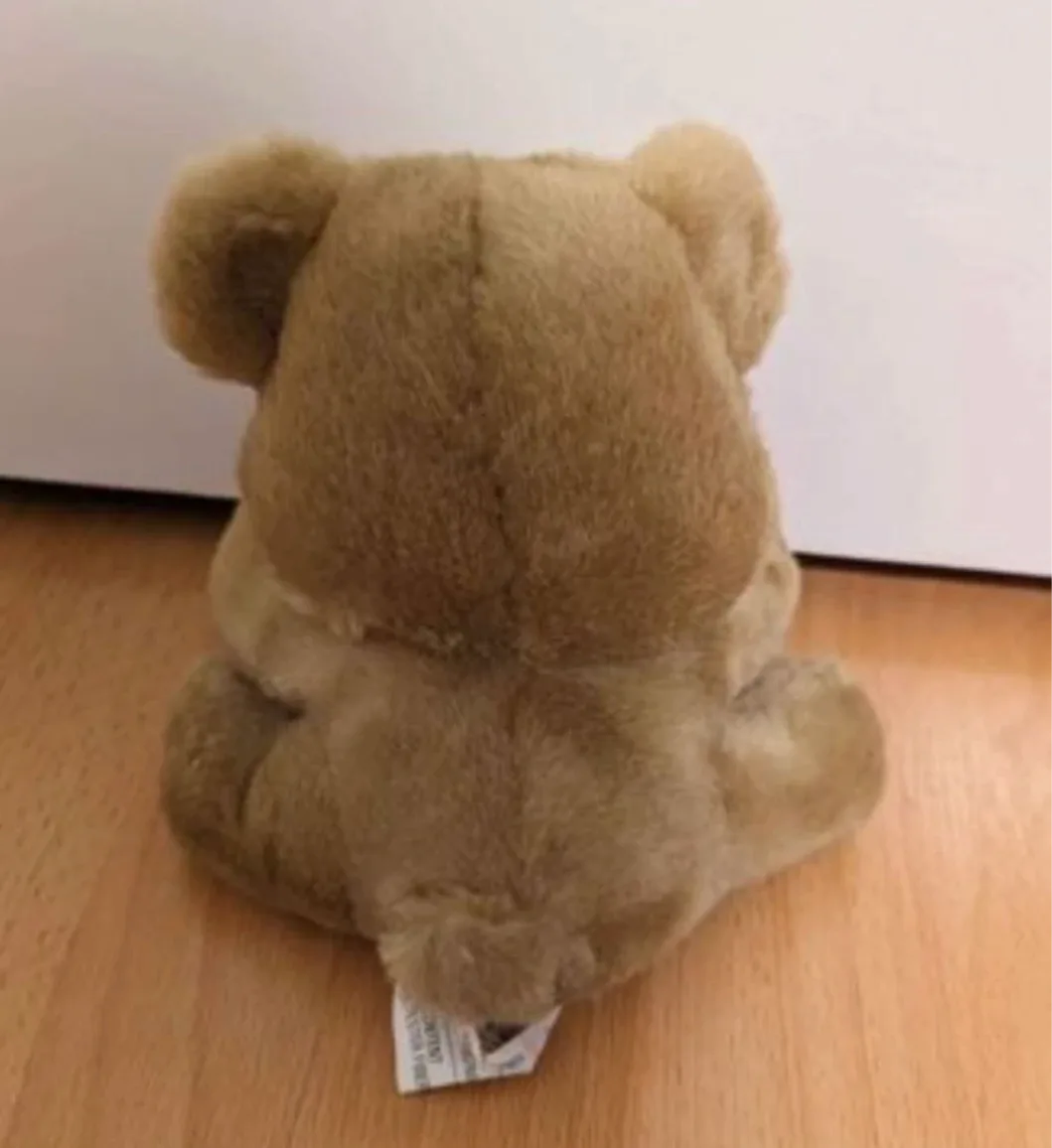 Adorable Teddy Bear Plush with Heart image indicator(2)