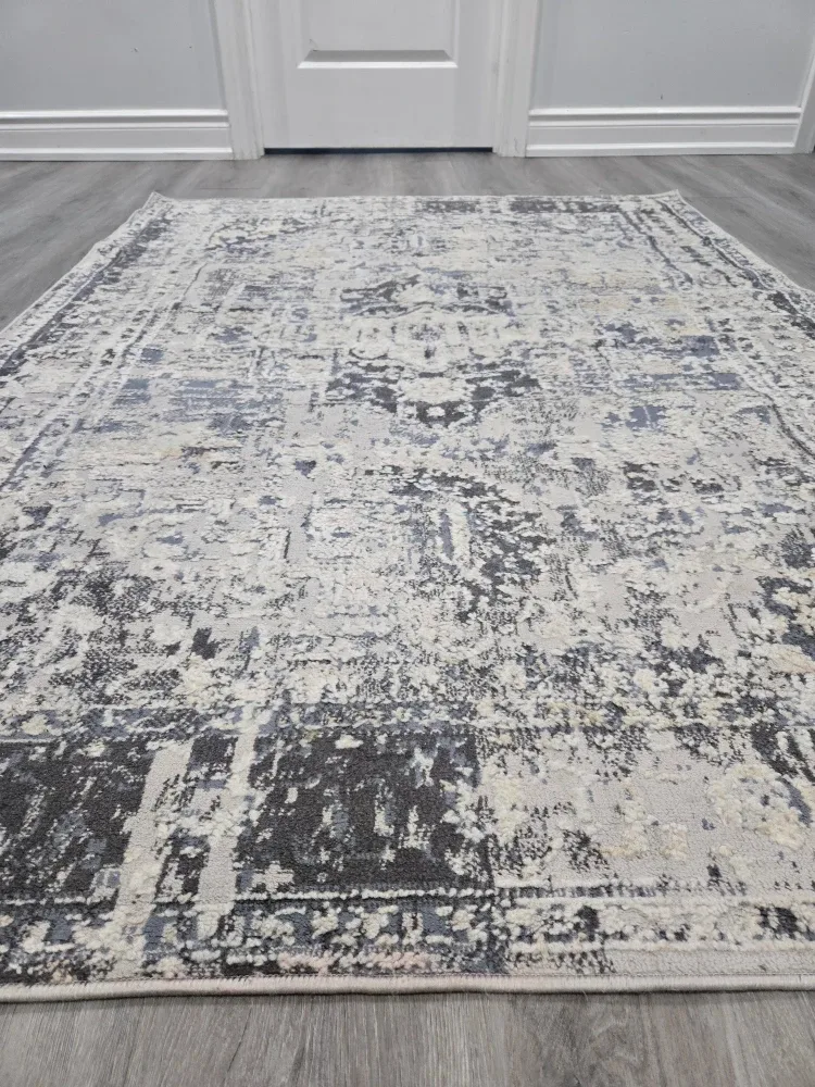 Small Area Rug (under coffee table) Grey and White Patterned