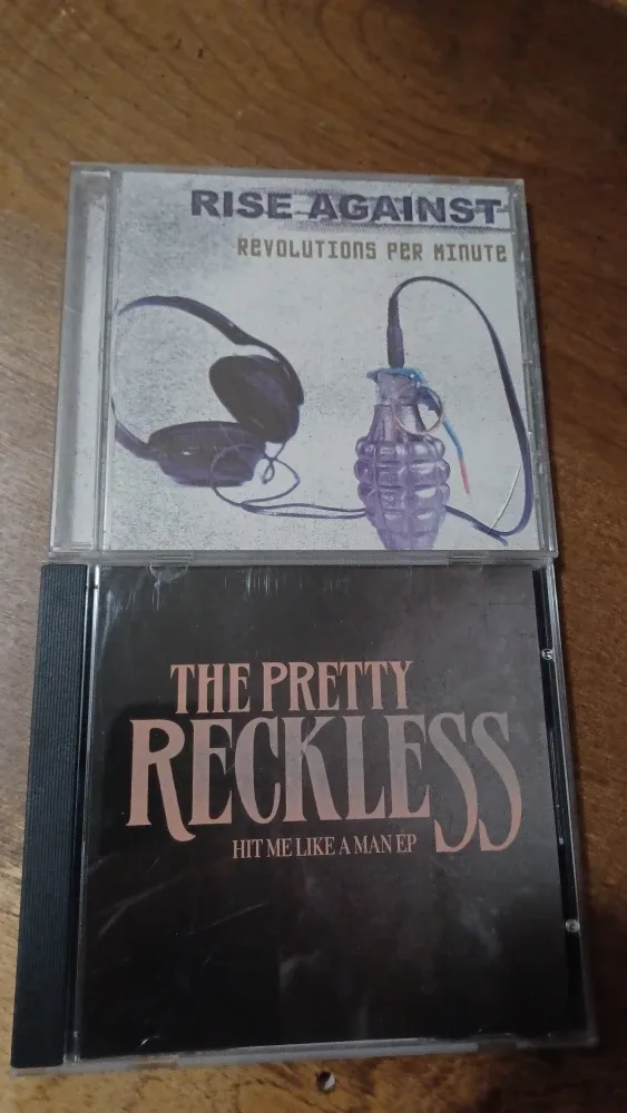 Mixed CD Lot: Pantera, Rise Against, The Pretty Reckless image indicator(4)
