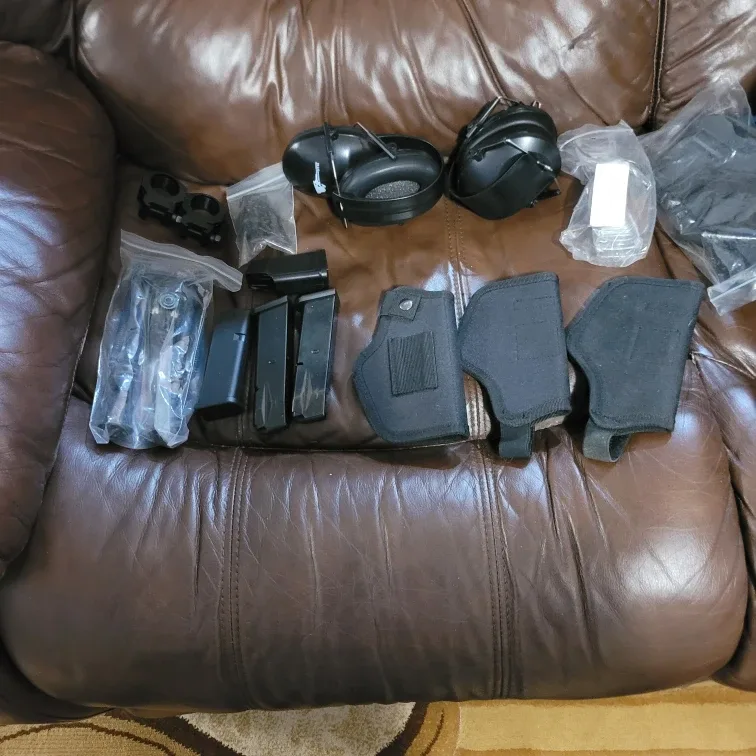 Assorted Holsters, Ear Protection, and Accessories
