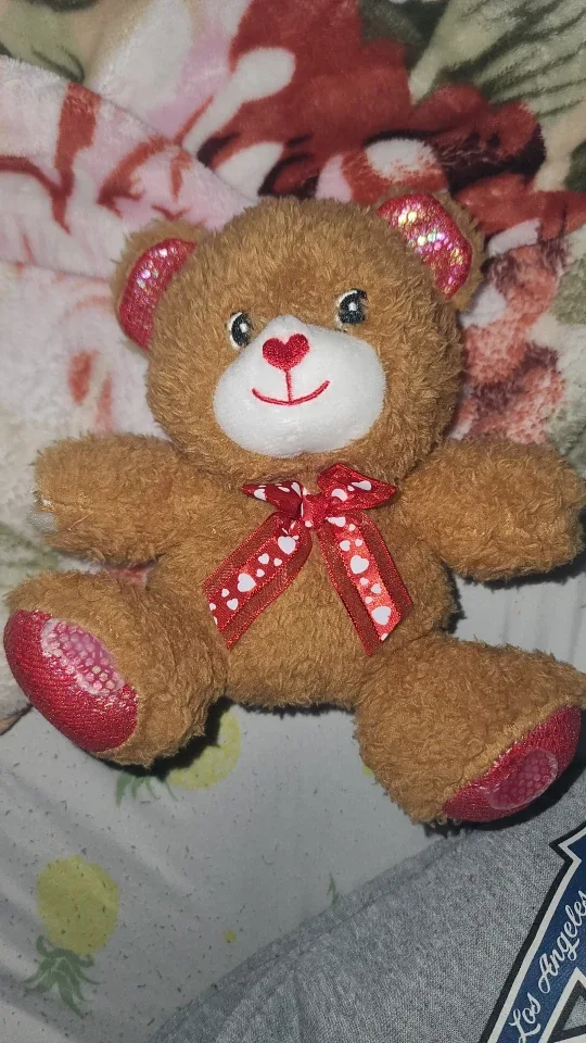 Cute Brown Teddy Bear with Red Bow