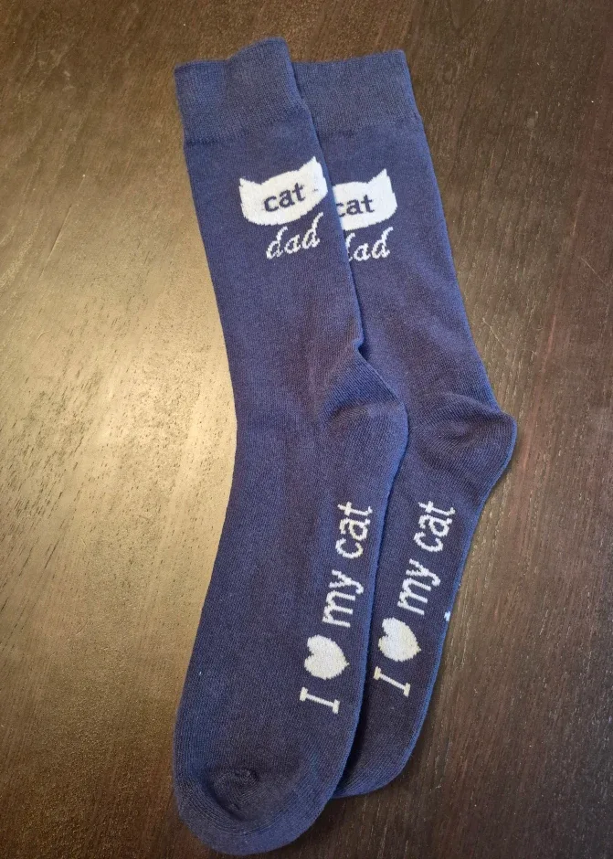 New cat dad navy socks. Pick up in Kitchener, $5