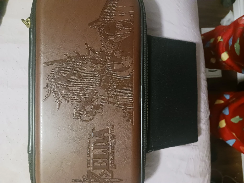 Nintendo Switch Lite Turquoise with Zelda Case and black case. - photo 4