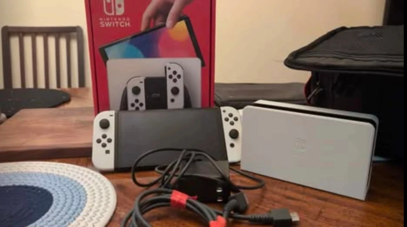 Nintendo Switch OLED + Games & Accessories