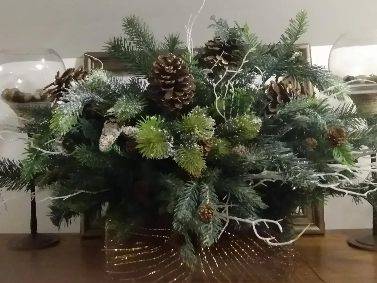 Realistic  Winter Pine Arrangement in oblong glass vase