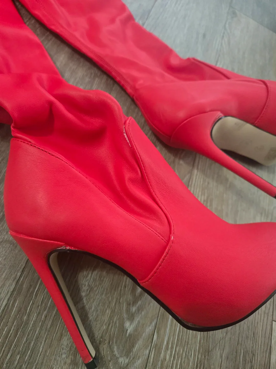 Thigh high red stiletto boots image indicator(6)