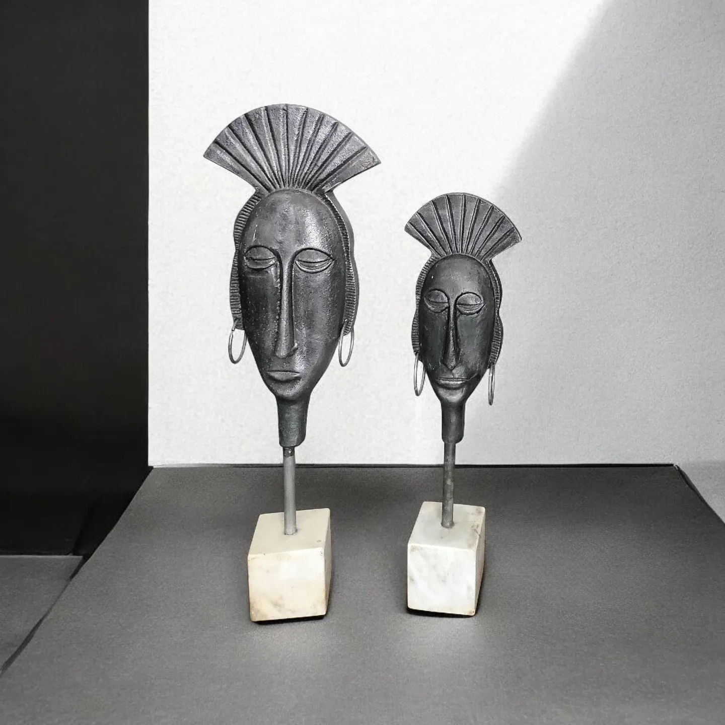 Pair of Decorative Metal AfricanFace Sculptures image indicator(3)