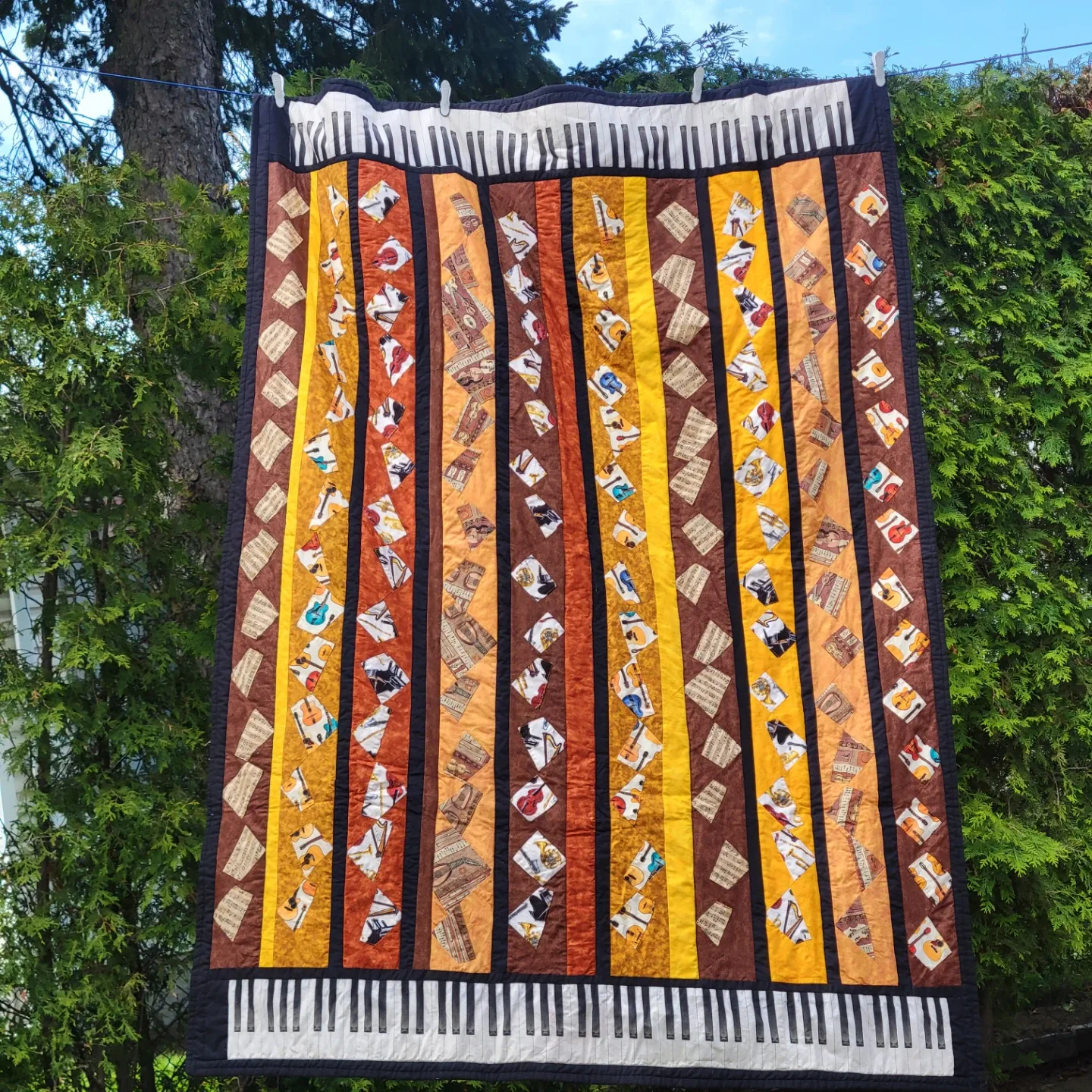 Handmade Quilted Blanket with Musical Instrument Design image indicator(2)