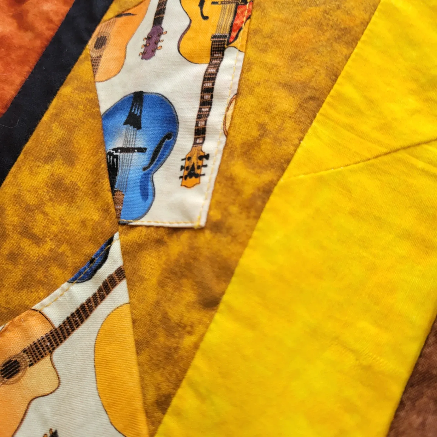 Handmade Quilted Blanket with Musical Instrument Design image indicator(6)