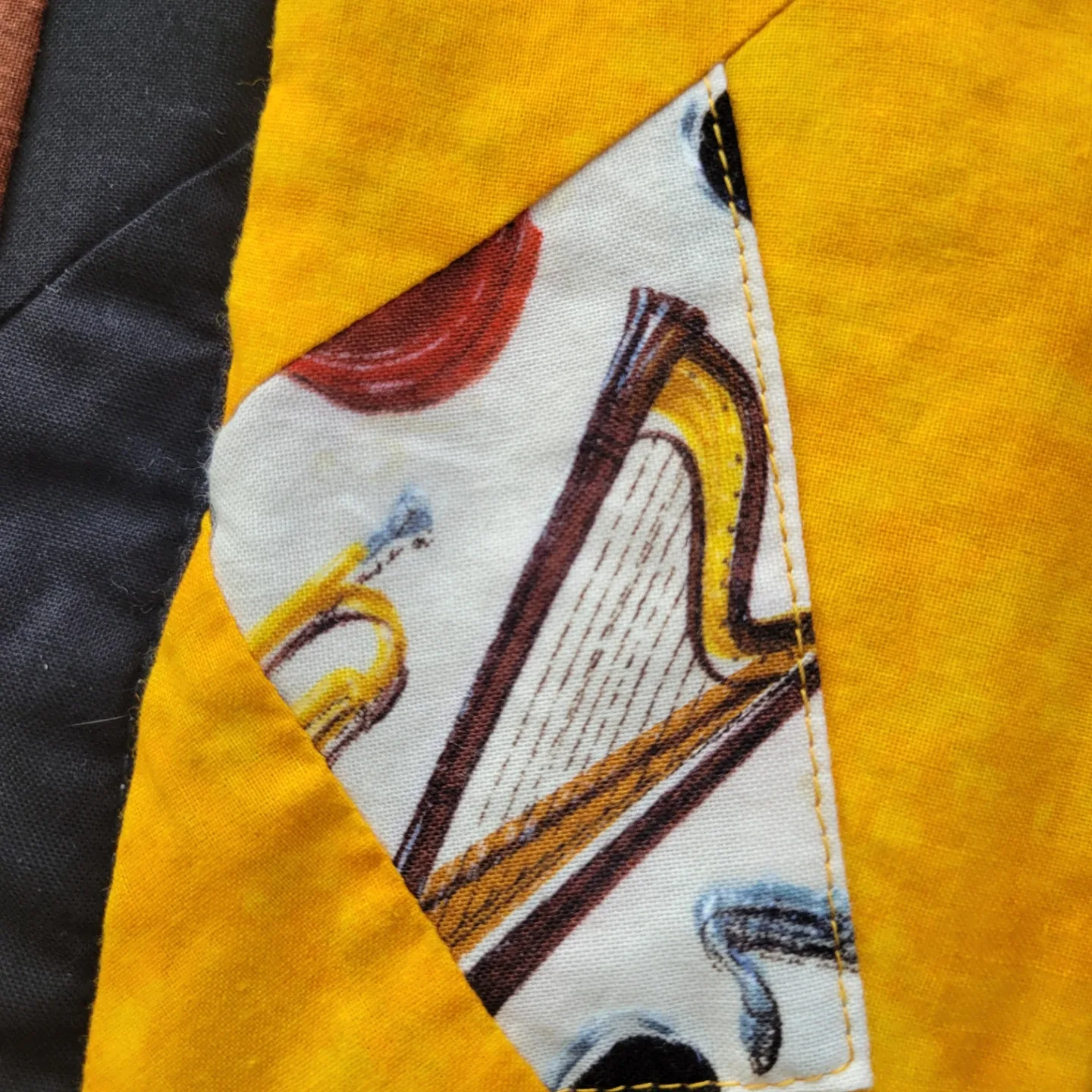 Handmade Quilted Blanket with Musical Instrument Design image indicator(7)