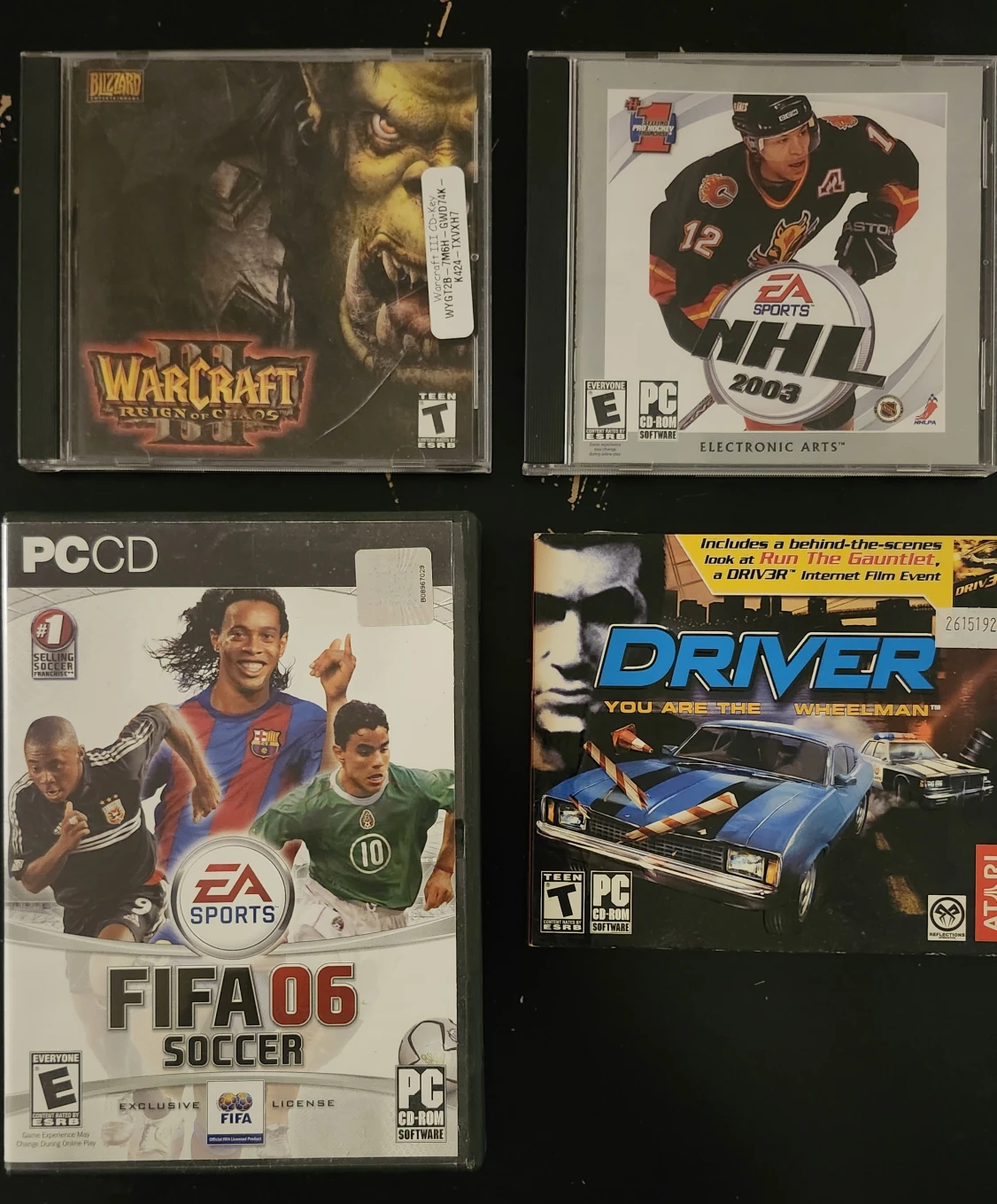 PC Games: Warcraft III, NHL 2003, FIFA 06, Driver