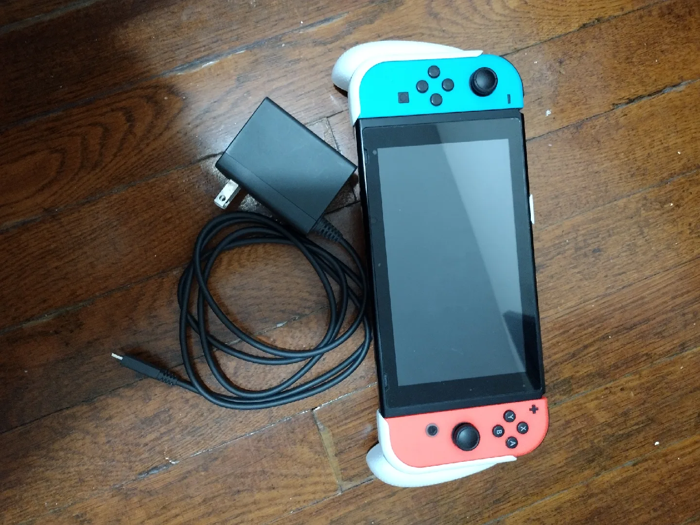 Nintendo Switch with Co Grip and Charger and Pokemon Shield Game image indicator(5)