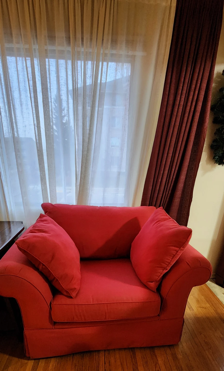 Red Armchair with Pillows