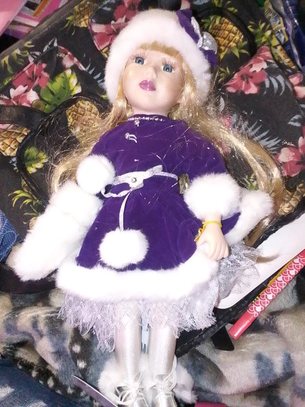 Porcelain Doll in Purple and White Outfit