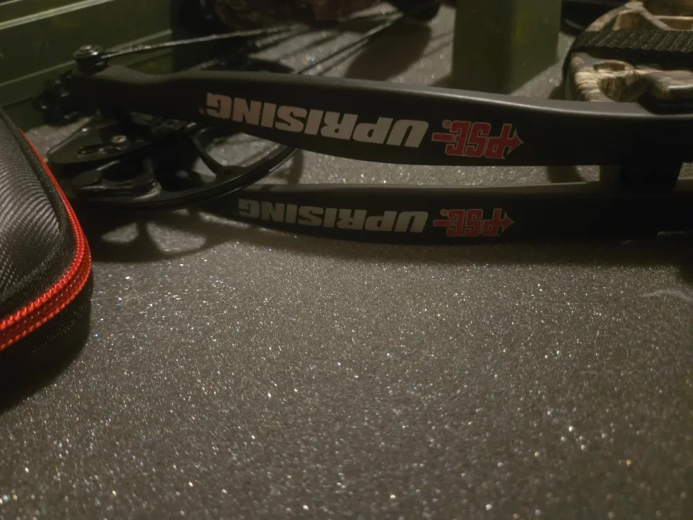 PSE Uprising Compound Bow with Arrows and Case image indicator(5)