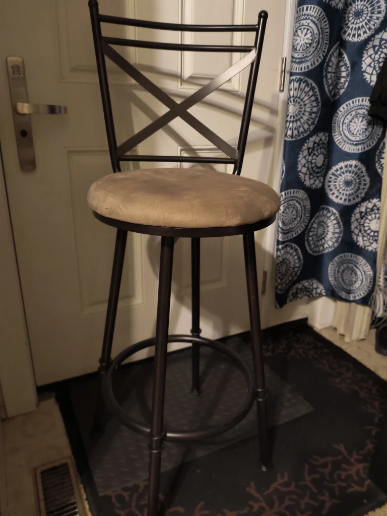 One reg. Chair and one bar stool chair.
