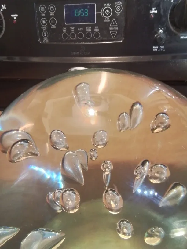 Modernist & Large Clear Controlled Bubbles Art Glass Ball 8" image indicator(4)