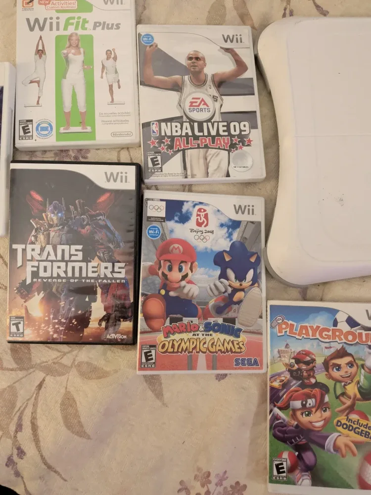 Wii Game Bundle - Wii Fit Plus, Ben 10, Transformers + image indicator(4)