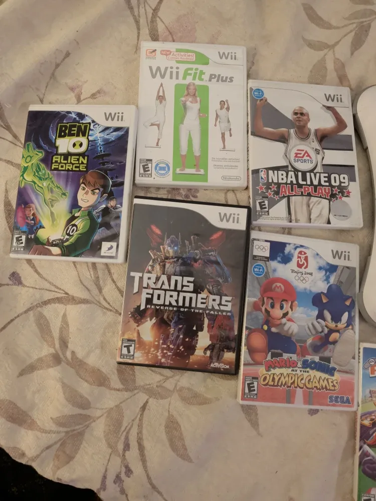 Wii Game Bundle - Wii Fit Plus, Ben 10, Transformers + image indicator(5)
