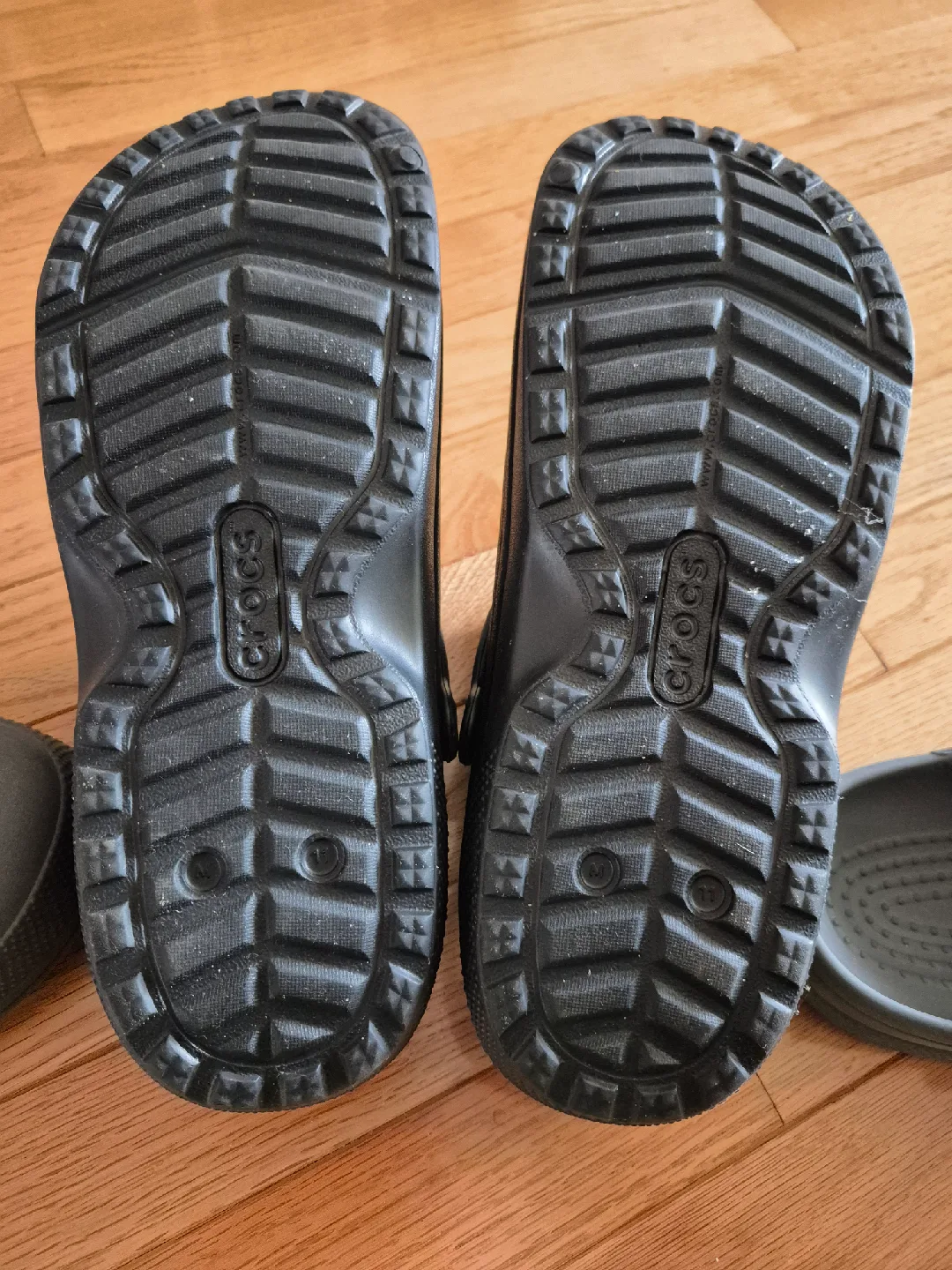 Crocs: 2 pairs Men's Size 11 + a free pair ($40 for the lot) image indicator(4)